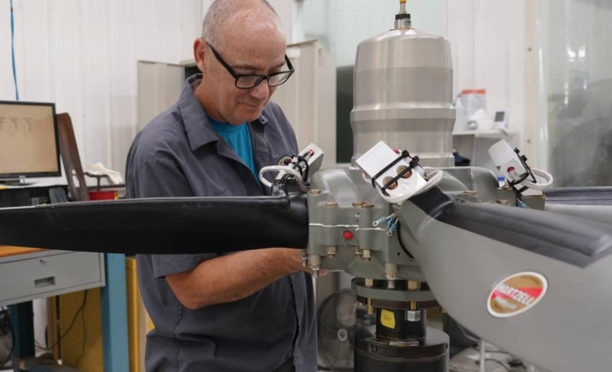 Closeup of Hartzell technician adjusting Hartzell Propeller